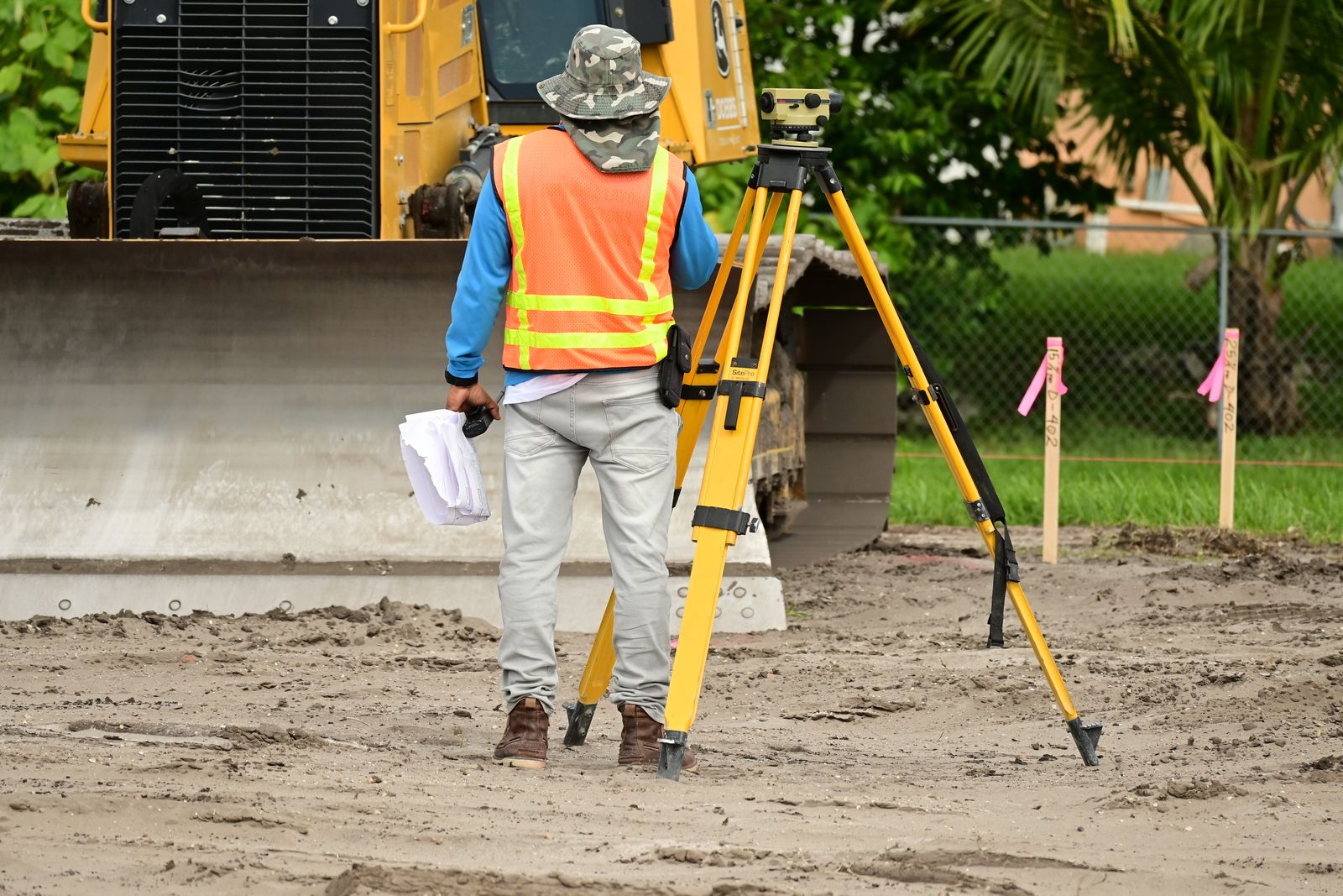 Surveyor collecting positions on site
